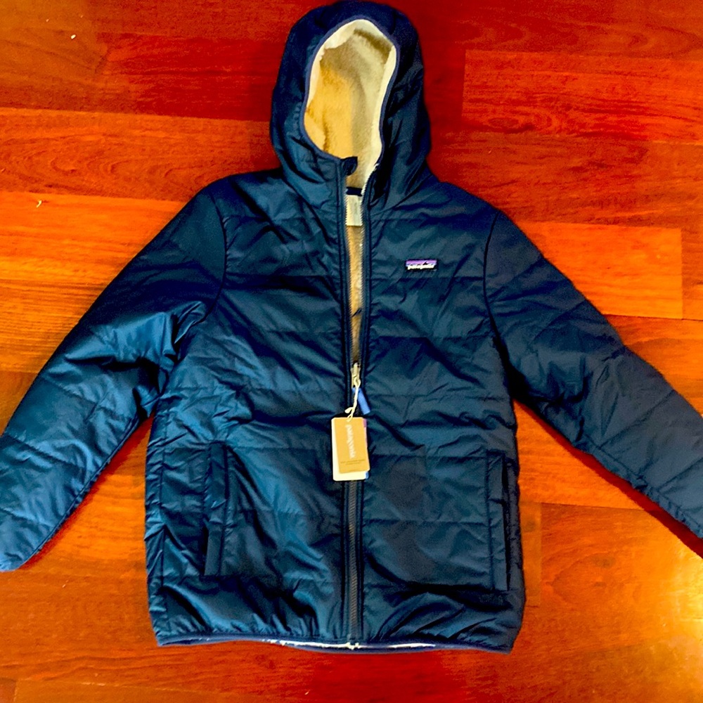 Brand new with tags reversible boys Freddy Hoody. Navy and cream size XL 14